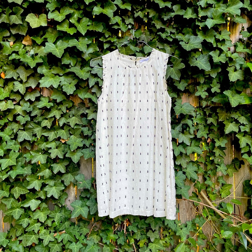 White dress with black embellishments and frills women size medium NWT